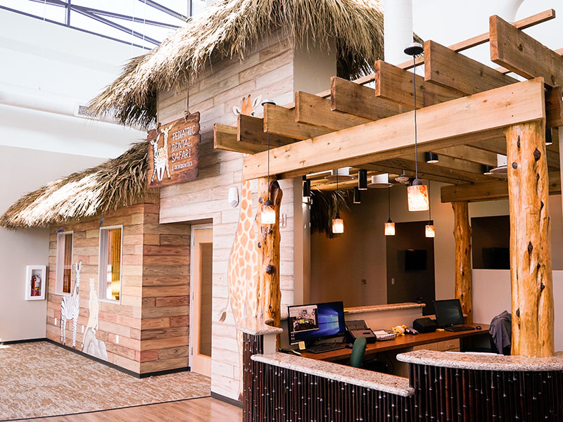 Safari-themed front desk and welcome area